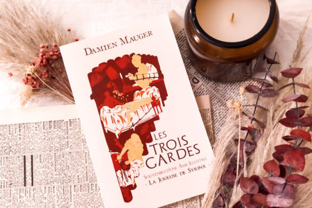 La couverture de Les trois gardes : La joueuse de Syrinx, un roman de dark fantasy, dont l’image suggère une atmosphère sombre et un univers riche en aventure et mystère.
