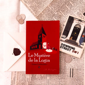 La couverture du roman Justan Lockholmes - Le mystère de la Logia, un thriller palpitant mêlant mystère et réflexion logique, avec des détails visuels qui rappellent l’univers sombre de Sherlock Holmes.