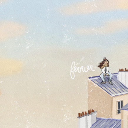 Fond d'écran pour ordinateur représentant les toits de Paris sous un ciel hivernal avec des couleurs douces de l’aube.